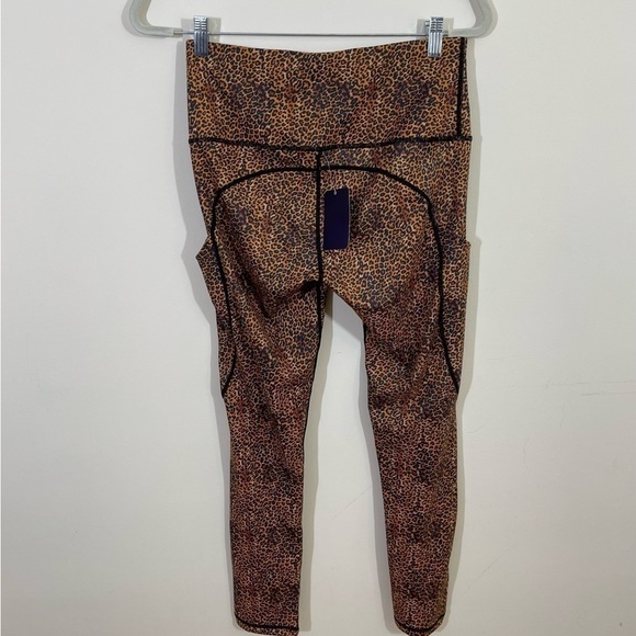 N.W.T. Yomover sz Md compression leggings in a brown animal print - Picture 3 of 10